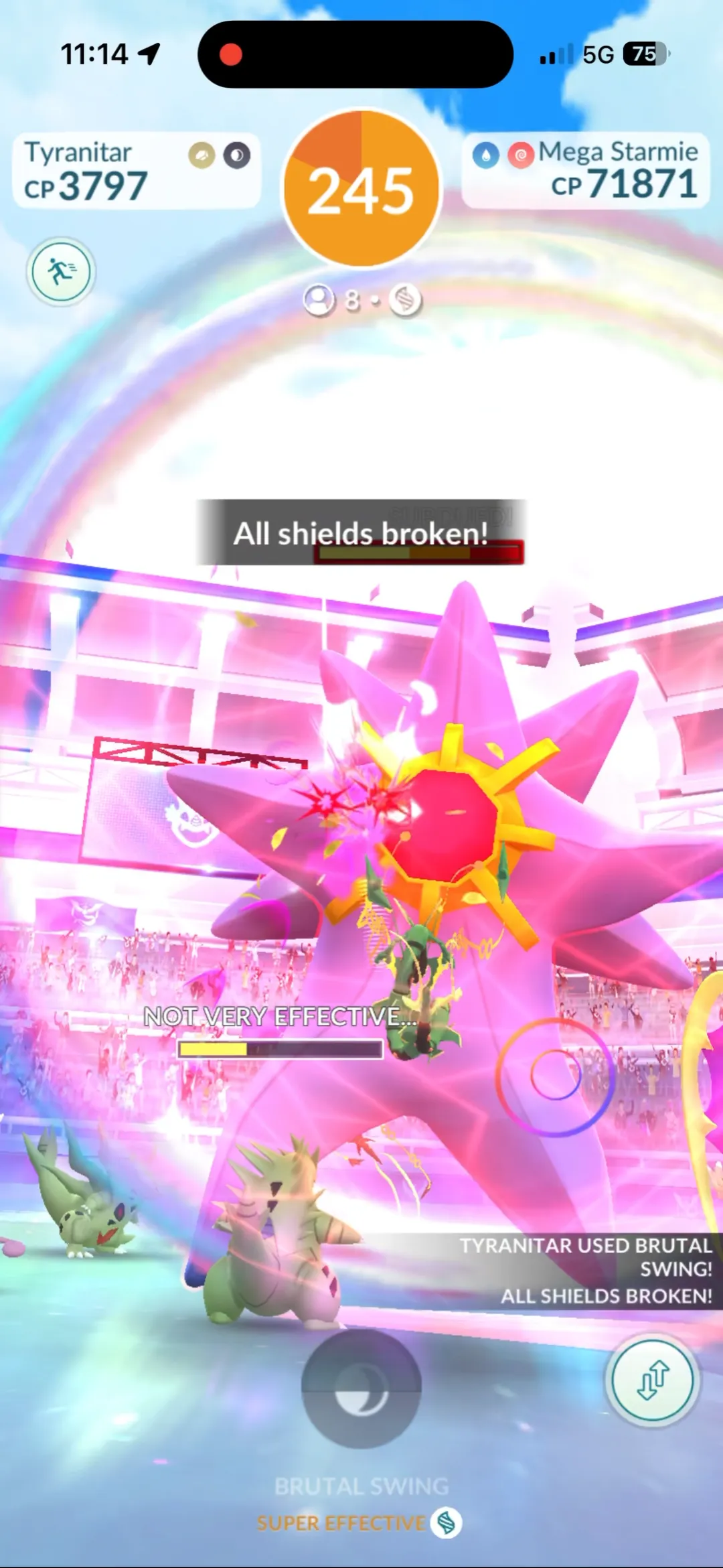 Raid battle screen with the message All shields broken as Mega Starmie takes a super effective hit