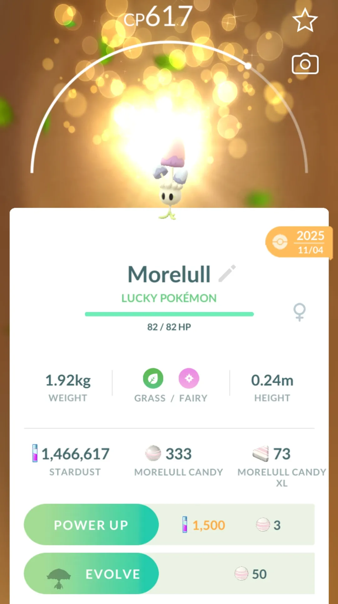 Pokémon GO detail screen for a Lucky Morelull showing the Evolve button with a cost of 50 Morelull Candy